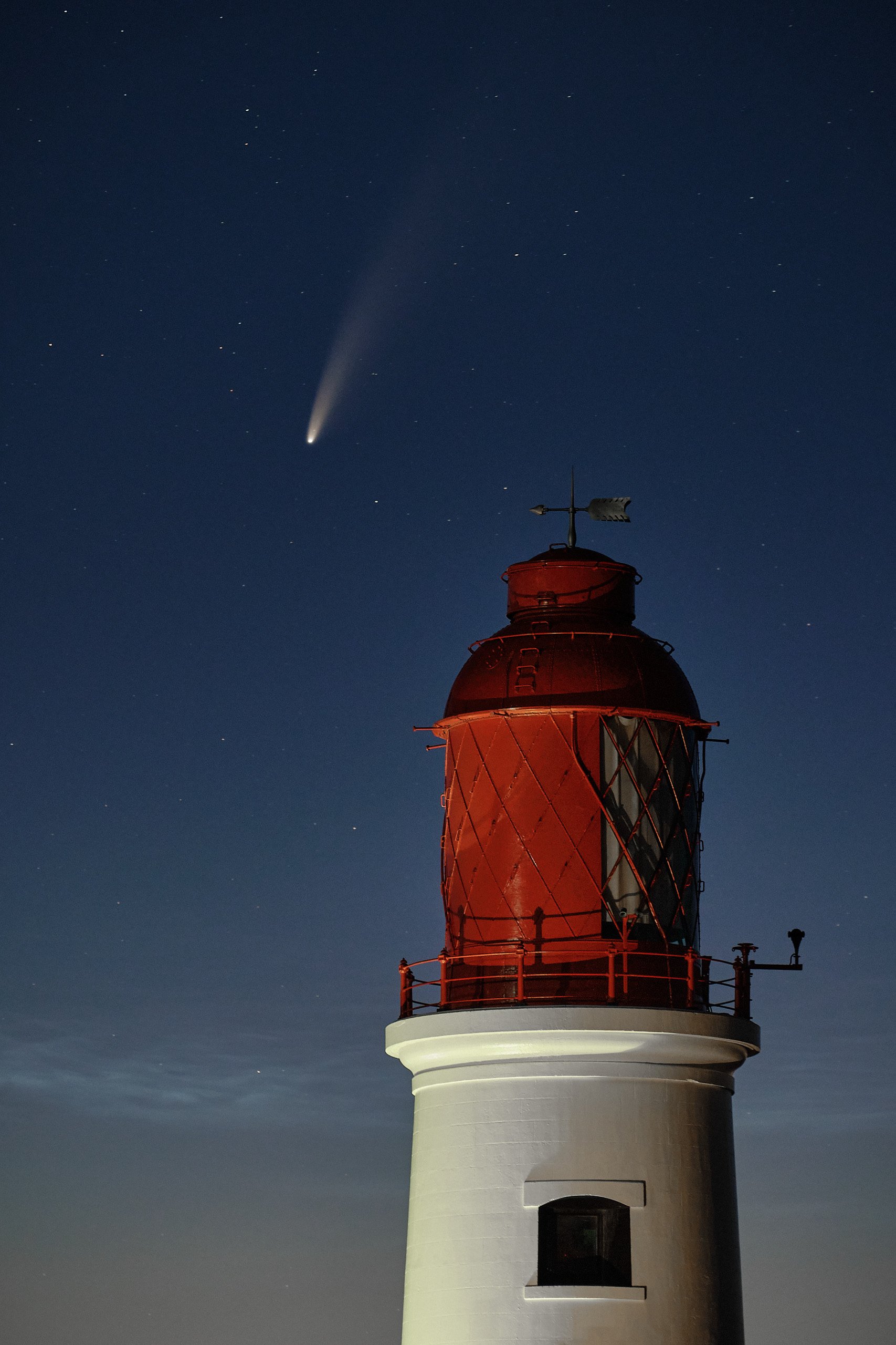 Souter Lighthouse red lantern room with Comet NEOWISE streaking above