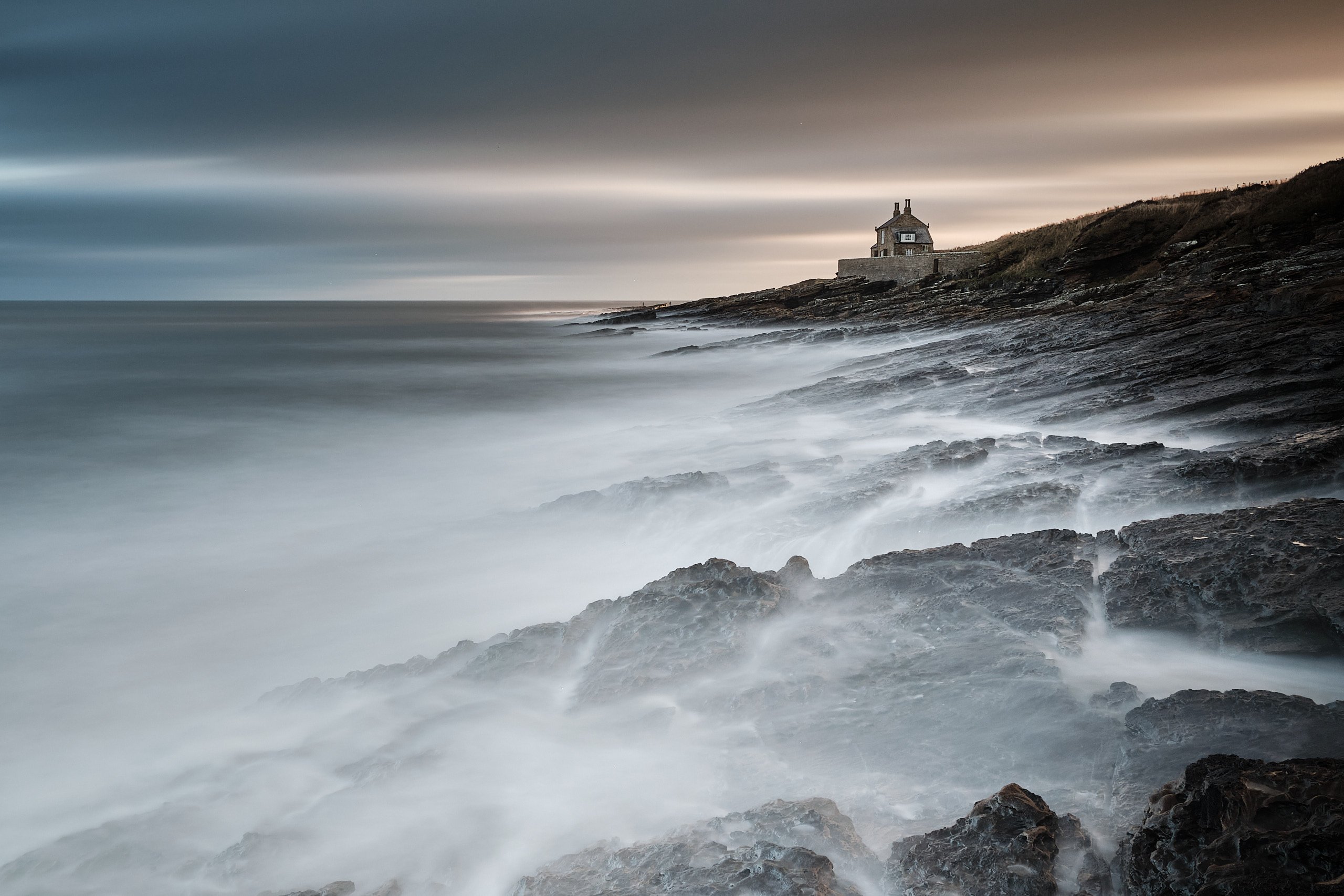 Howick Bathing House on a wave-battered Northumberland shoreline